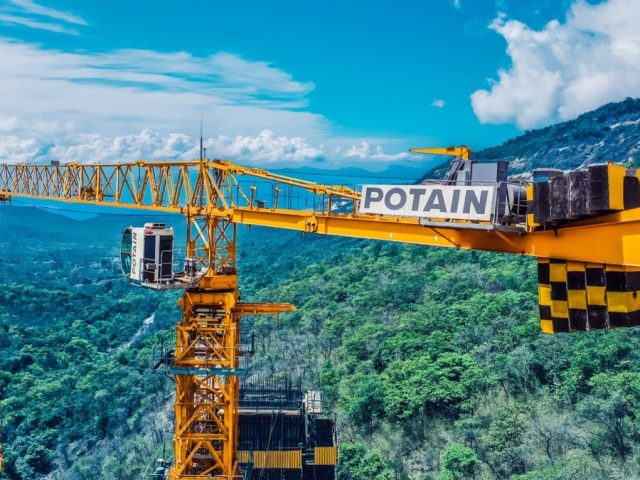 four potain mct 385 topless cranes deliver record breaking indian bridge project 01