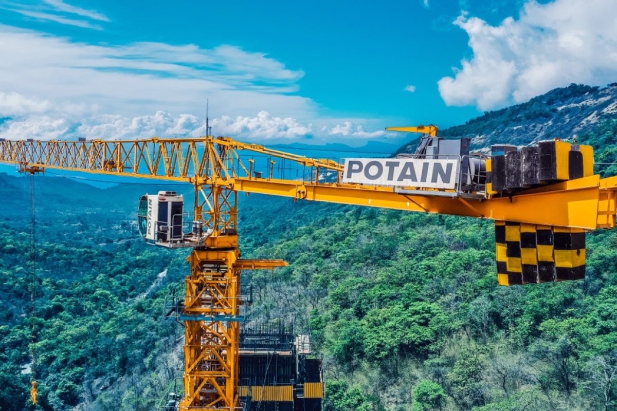 four potain mct 385 topless cranes deliver record breaking indian bridge project 01