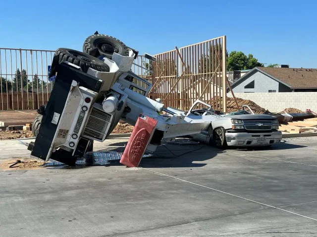 chevy truck crush by construction crane 2