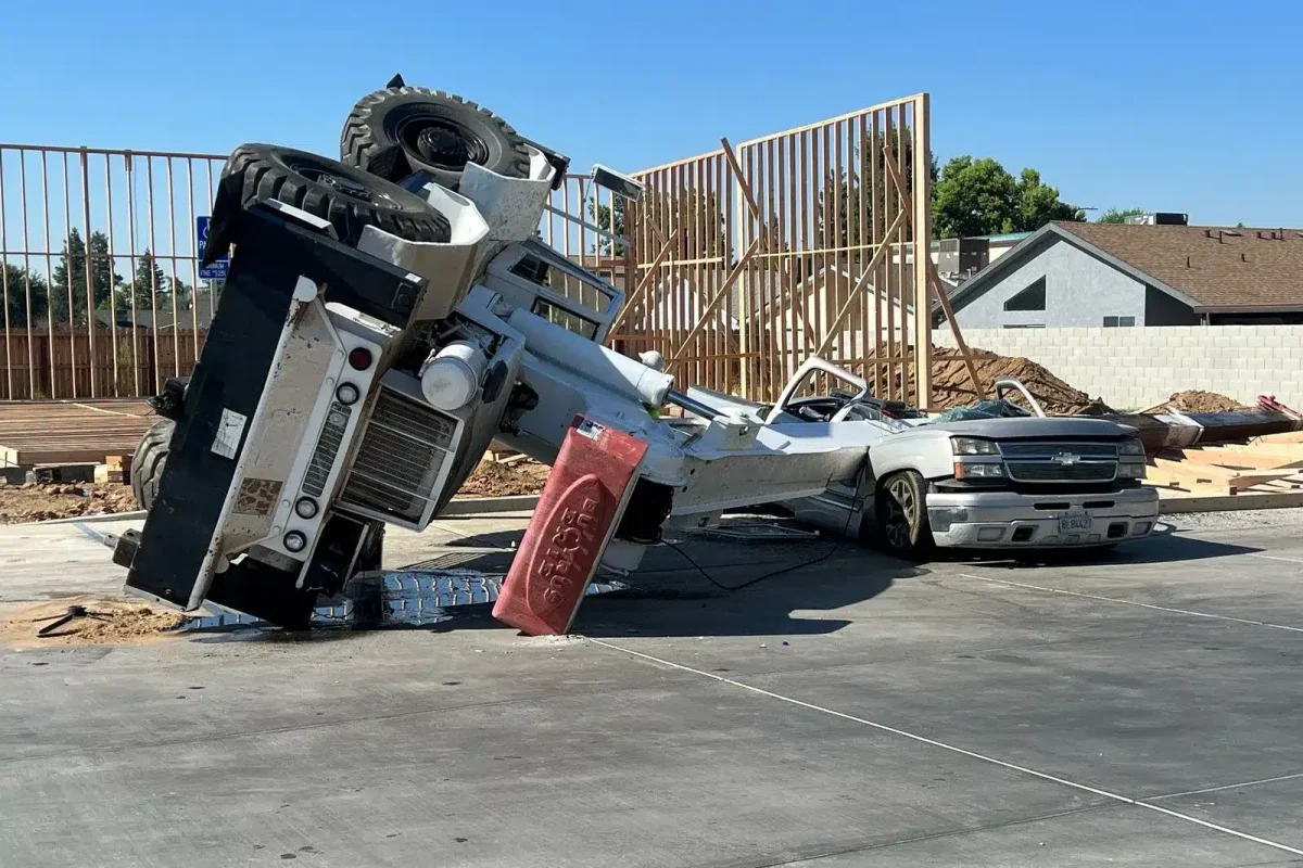 chevy truck crush by construction crane 2