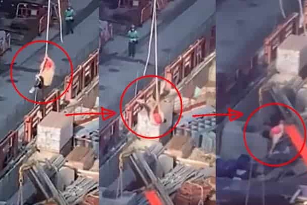 construction worker dangling from crane hongkong