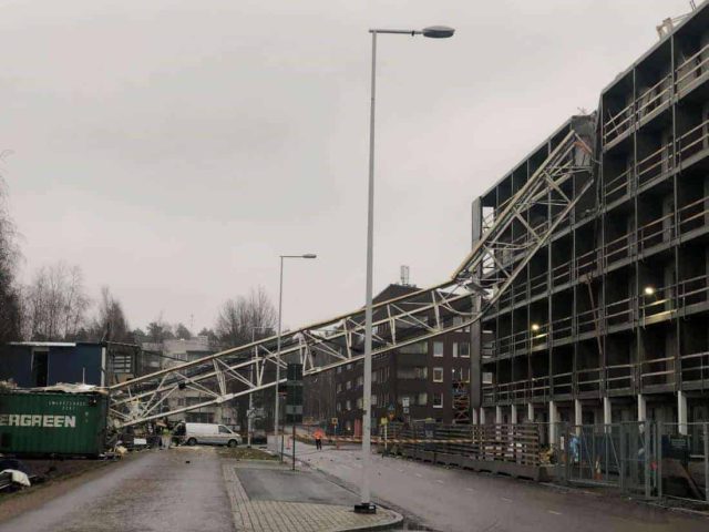 Jib of tower crane lay across the street